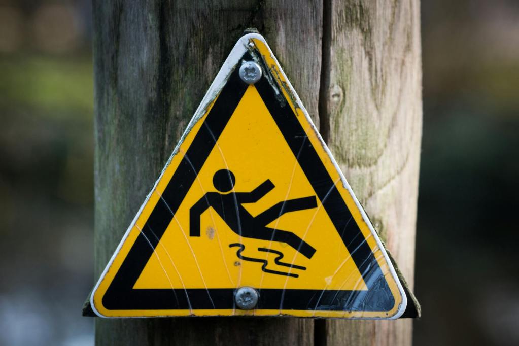 sign slippery wet caution